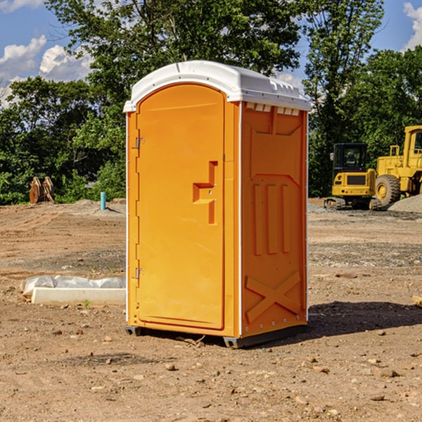 how often are the porta potties cleaned and serviced during a rental period in Bates